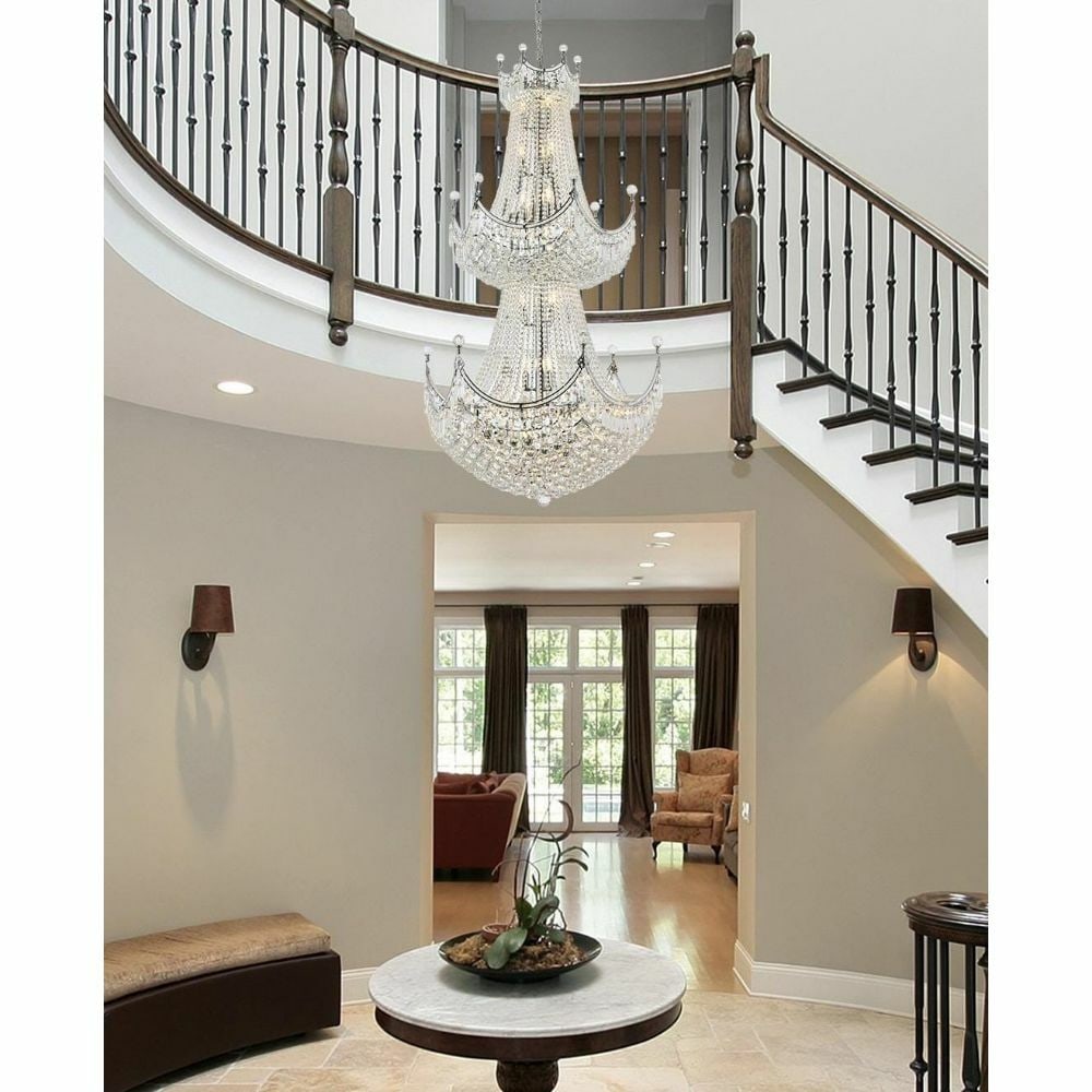 Corona 36-Light Chrome Crystal Foyer Fixture 66": Corona 36-Light Chrome Crystal Foyer Fixture 66" Illuminate your space with this stunning 36-Light Chrome Crystal Chandelier. Designed in a modern empire style, this chandelier features a polished chr