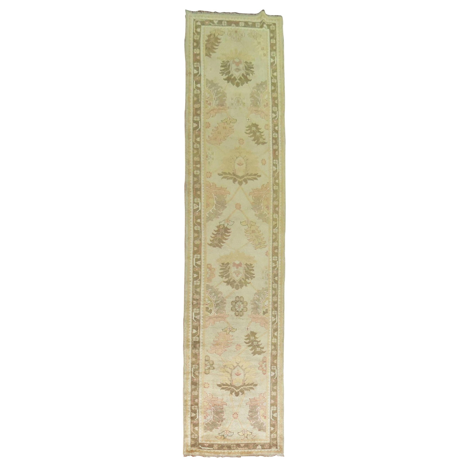 Hand-Knotted Turkish Oushak Wool Runner: Hand-Knotted Turkish Oushak Wool Runner This traditional Turkish Oushak runner features a classic design in khaki and brown tones. Hand-knotted from recycled vegetable-dyed wool originally used in mid