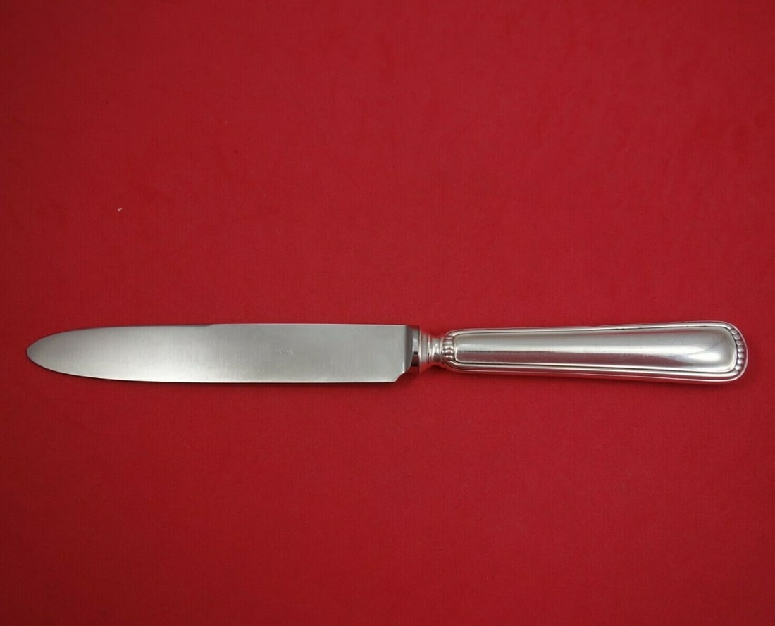 Argenteria Vicentina Milano 9 7/8" .925 Silver Dinner Knife: Argenteria Vicentina Milano 9 7/8" .925 Silver Dinner Knife This stunning dinner knife features a hollow handle design and is crafted from .925 silver, showcasing the elegant Milano pattern by Argente