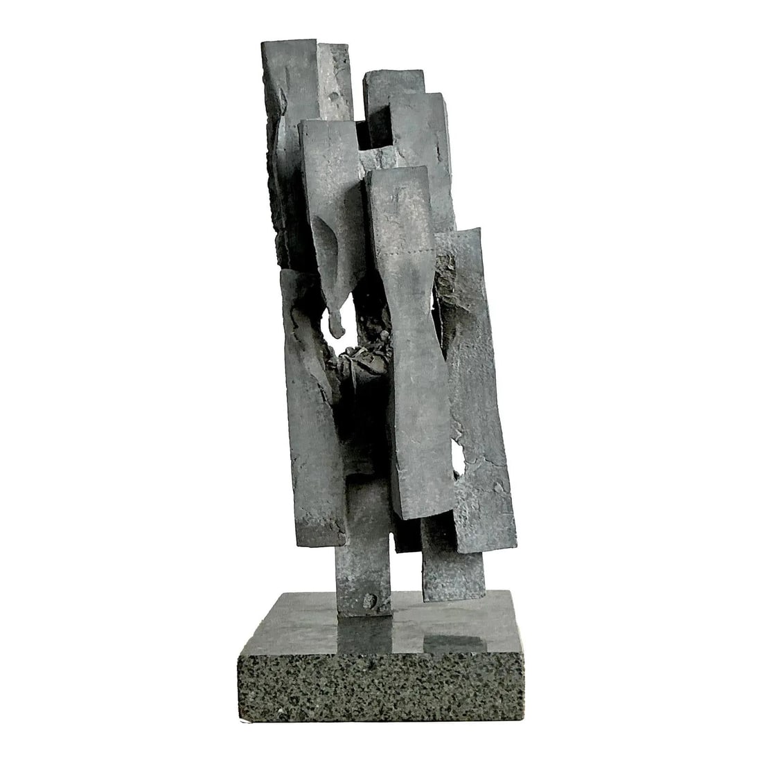 Mid Century Brutalist Abstract Aluminum Sculpture on Stone Plinth 19.75 Inch: Mid Century Brutalist Abstract Aluminum Sculpture on Stone Plinth 19.75 Inch This vintage Brutalist Modernist sculpture features a rugged, vertical abstract form with a heavily textured industrial gre