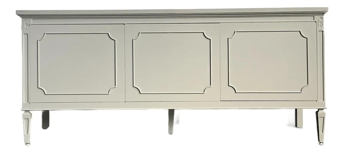 French Regency Style Marble Top Sideboard With Notched Wood Detail: French Regency Style Marble Top Sideboard With Notched Wood Detail This vintage credenza showcases a blend of French Neoclassical style and Hollywood Regency appeal. It features a three-panel inset ma