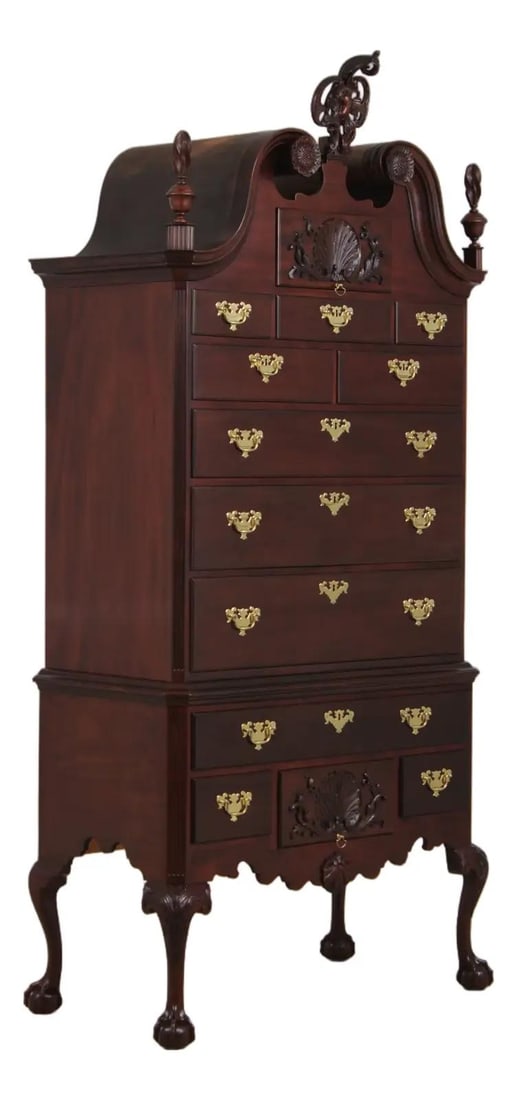 Mahogany Colonial Williamsburg highboy Baker Model 8807: Mahogany Colonial Williamsburg highboy Baker Model 8807 This Baker Colonial Williamsburg highboy is crafted from mahogany and features a classic Chippendale style inspired by 18th-century design. The 