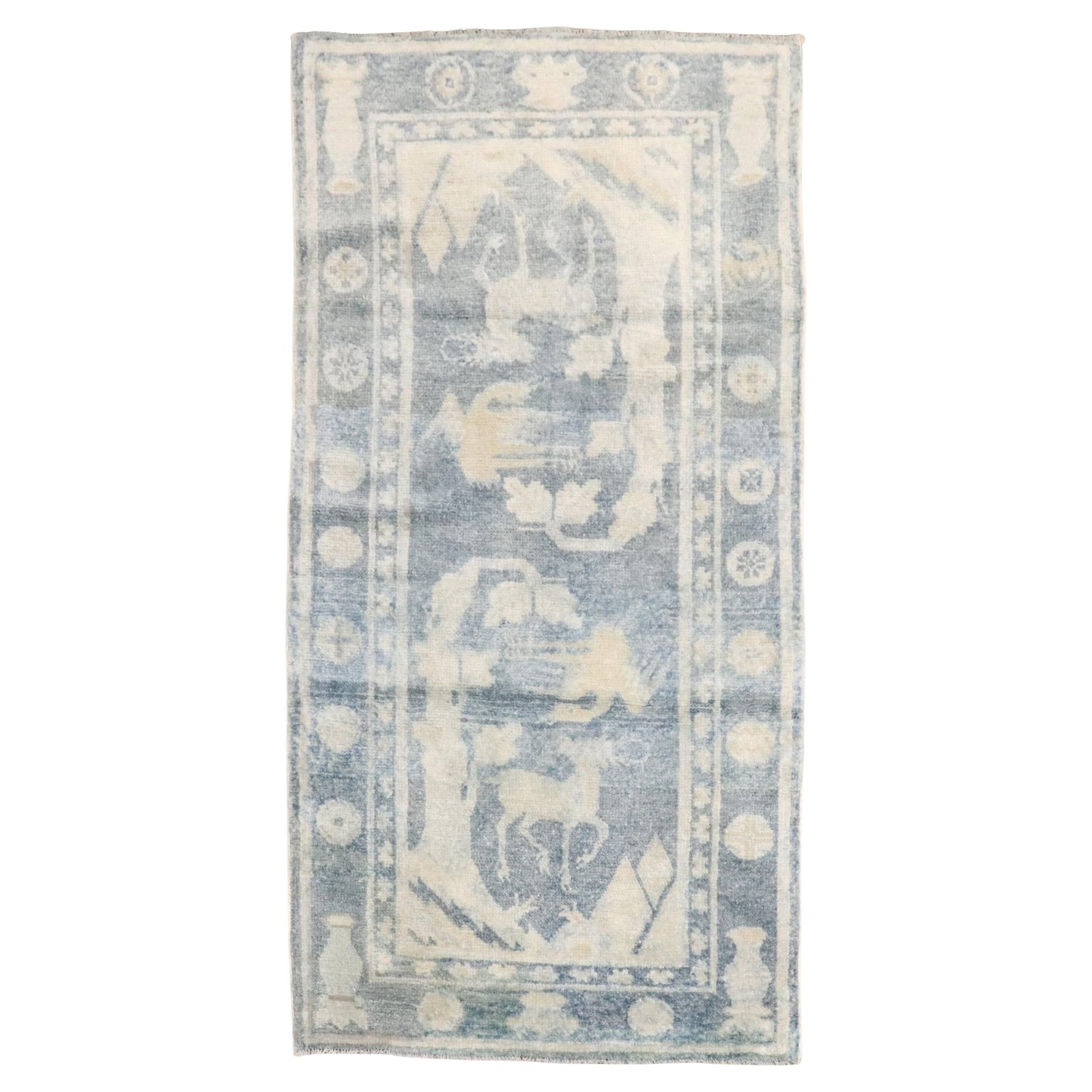 Blue Chinese Wool Rug with Reindeer Motif Chinoiserie 25 x 50 Inch: Blue Chinese Wool Rug with Reindeer Motif Chinoiserie 25 x 50 Inch This small Chinese pictorial rug features two reindeers on a blue field, crafted in the Chinoiserie style. Hand-woven from wool, the 