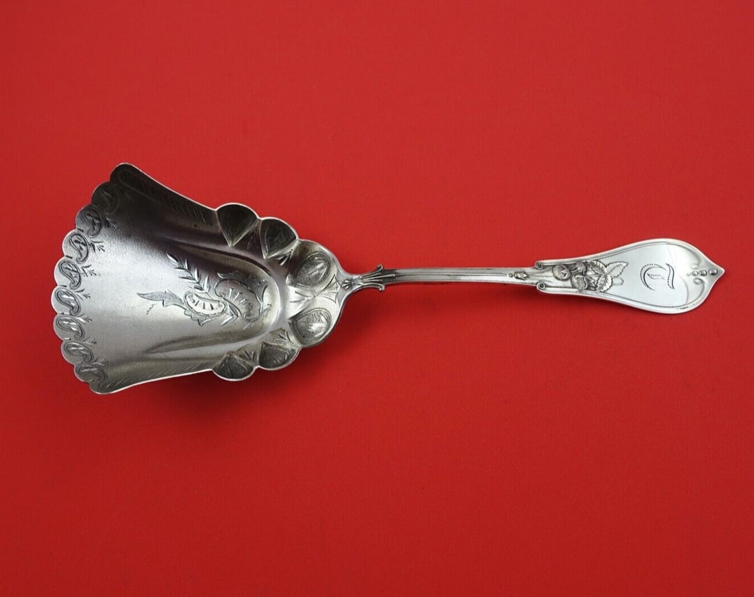 Strawberry Pattern Coin Silver Fruit Scoop Gold Wash 9 3/8 inches: Strawberry Pattern Coin Silver Fruit Scoop Gold Wash 9 3/8 inches This exquisite fruit scoop features the elegant Strawberry pattern by various makers, crafted from high-quality sterling silver. The p