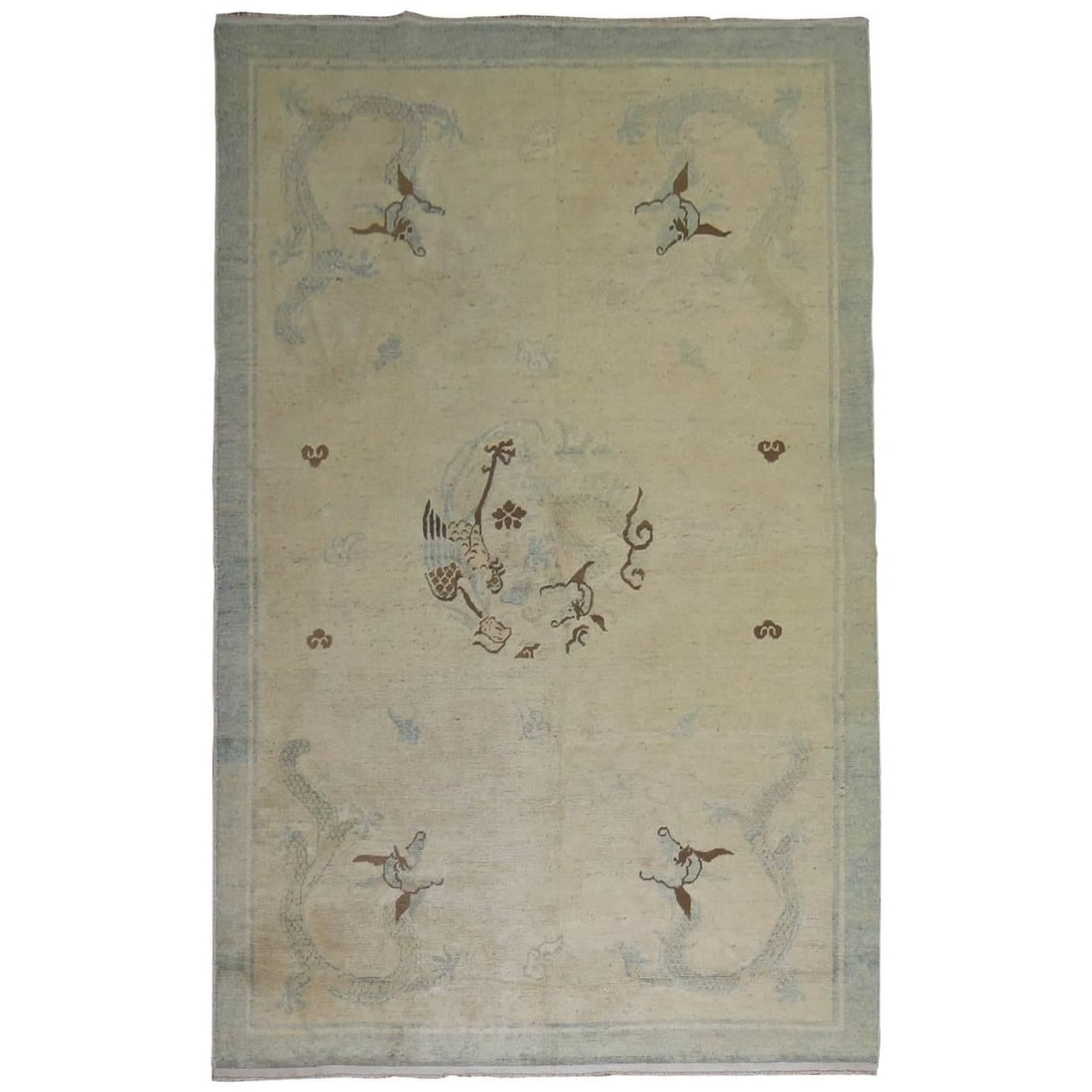 71 x 105 Inch Handwoven Wool Chinoiserie Rug with Dragon Medallion China Circa 1920: 71 x 105 Inch Handwoven Wool Chinoiserie Rug with Dragon Medallion China Circa 1920 This hand-woven Chinese Peking rug from the early 20th century features a striking dragon medallion motif set on an 