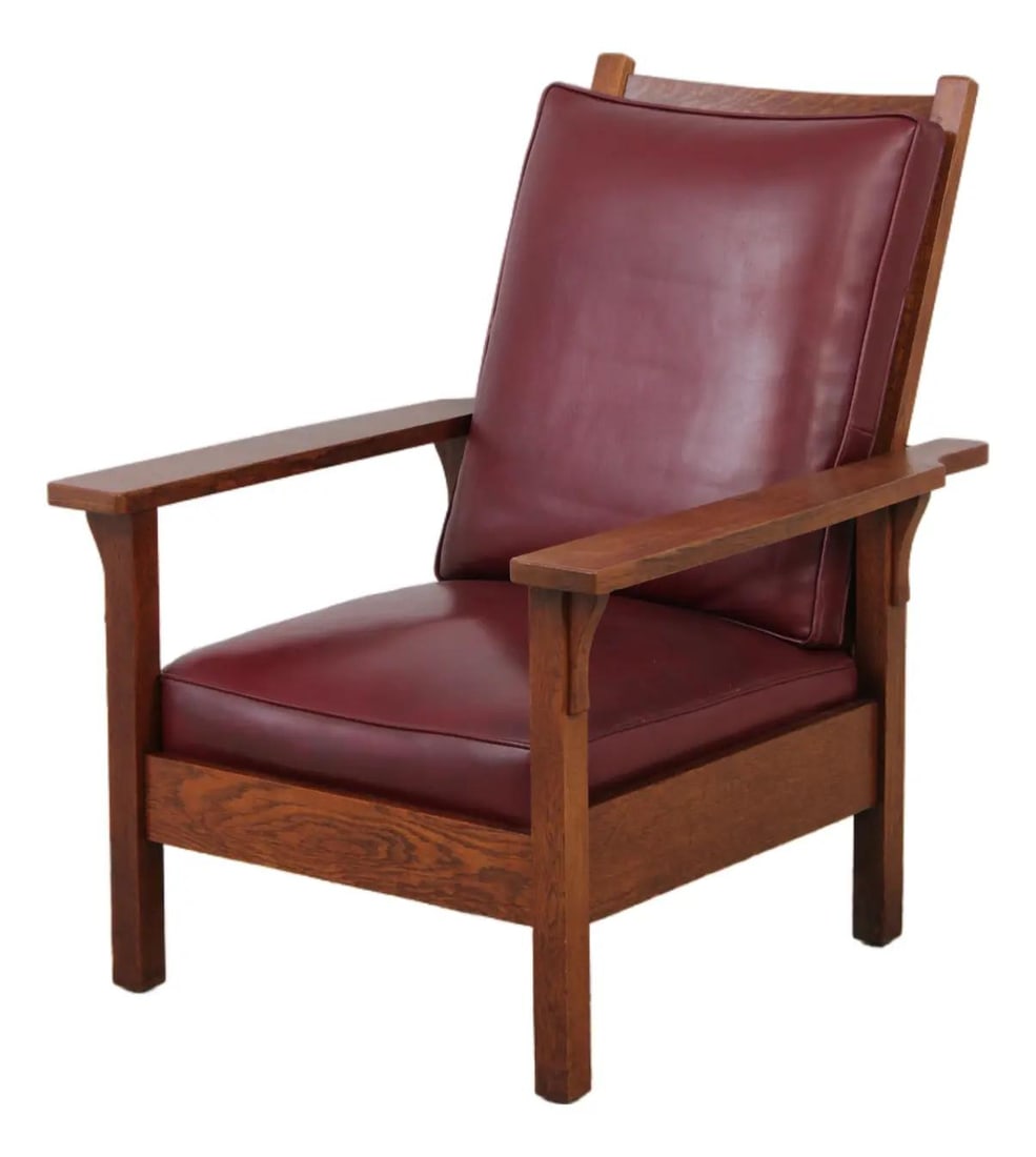 Mission Oak Morris Chair with Burgundy Leather Cushions Arts and Crafts Era: Mission Oak Morris Chair with Burgundy Leather Cushions Arts and Crafts Era This antique Mission-style Morris chair, dating from circa 1900-1910, features high-quality construction with quarter sawn o