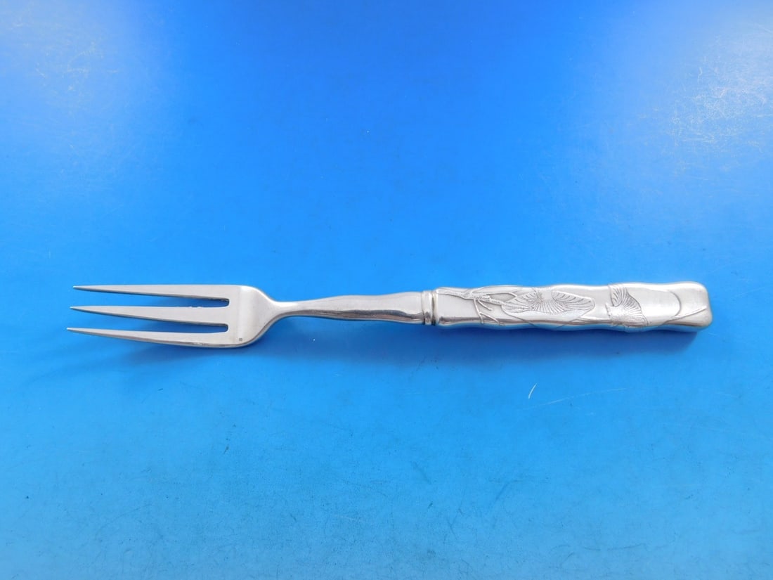 Tiffany Sterling Silver 7" Lap Over Acid Etched Fruit Fork with Mushroom Motif: Tiffany Sterling Silver 7" Lap Over Acid Etched Fruit Fork with Mushroom Motif This exquisite fruit fork from Tiffany & Co. features a Lap Over Edge pattern with a beautiful acid etched mushroom motif