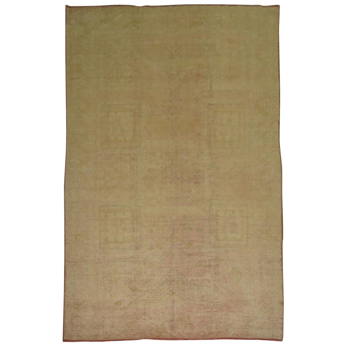 Hand-Knotted Wool Oushak Rug in Pale Salmon and Gold 6'4" x 9'3" Turkish Vintage: Hand-Knotted Wool Oushak Rug in Pale Salmon and Gold 6'4" x 9'3" Turkish Vintage This vintage Turkish Oushak rug from the mid-20th century features a pale salmon and gold color palette. Hand-knotted f