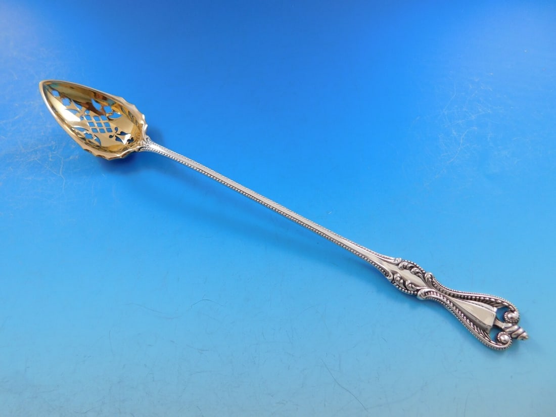 Towle Old Colonial Sterling Silver Olive Spoon Fancy Pierced 8 3/8": Towle Old Colonial Sterling Silver Olive Spoon Fancy Pierced 8 3/8" This exquisite olive spoon is crafted from sterling silver and features the timeless Old Colonial pattern by Towle. Measuring 8 3/8 