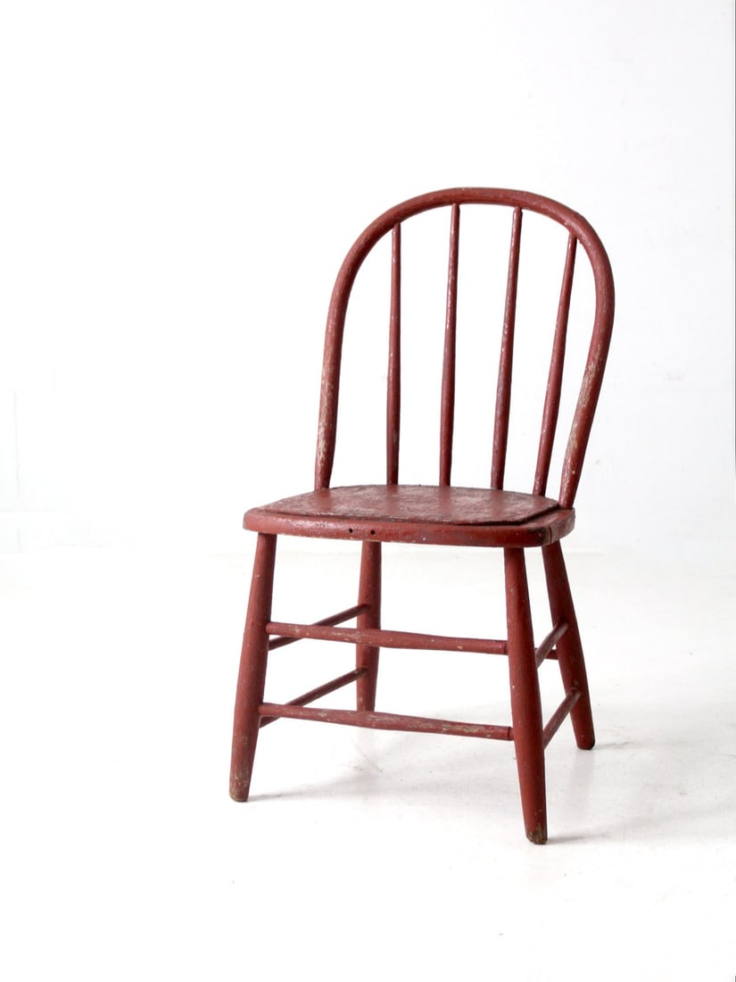 Antique Red Windsor Bow Back Spindle Chair Rustic Vintage: Antique Red Windsor Bow Back Spindle Chair Rustic Vintage This antique painted bow back Windsor chair features a charming aged red finish, perfect for adding a rustic touch to your dining area. The ch