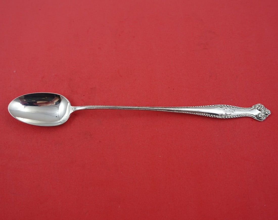 Towle Canterbury Sterling Silver Iced Tea Spoon 8 3/8": Towle Canterbury Sterling Silver Iced Tea Spoon 8 3/8" Experience timeless elegance with the Canterbury iced tea spoon from Towle, crafted in fine sterling silver. Measuring 8 3/8 inches, this beautif