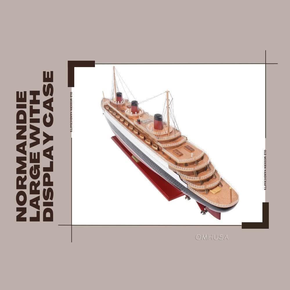Handmade Normandie Inspired Ship Model in Mahogany Display Case: Handmade Normandie Inspired Ship Model in Mahogany Display Case This handcrafted ship model, inspired by vintage designs, is presented in an elegant display case with a black dark mahogany finish. The