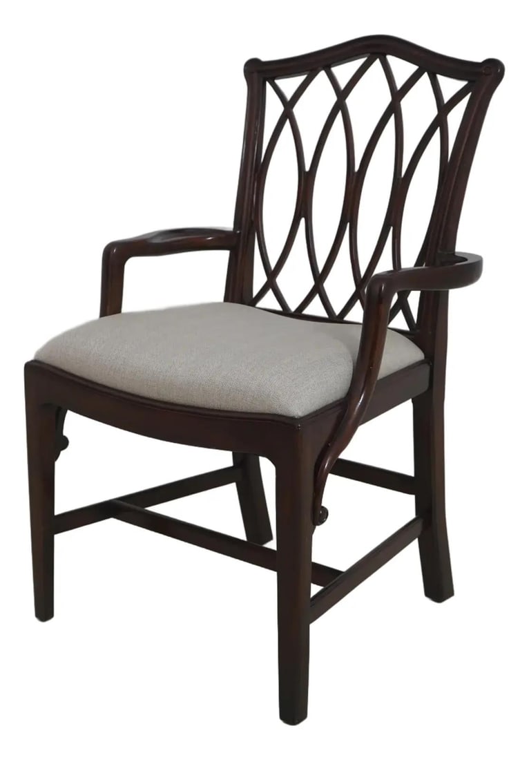 Mahogany Armchair in Chippendale Design by Theodore Alexander: Mahogany Armchair in Chippendale Design by Theodore Alexander This Theodore Alexander armchair is crafted from mahogany and features a Chippendale-inspired design. The chair is approximately 5 years o