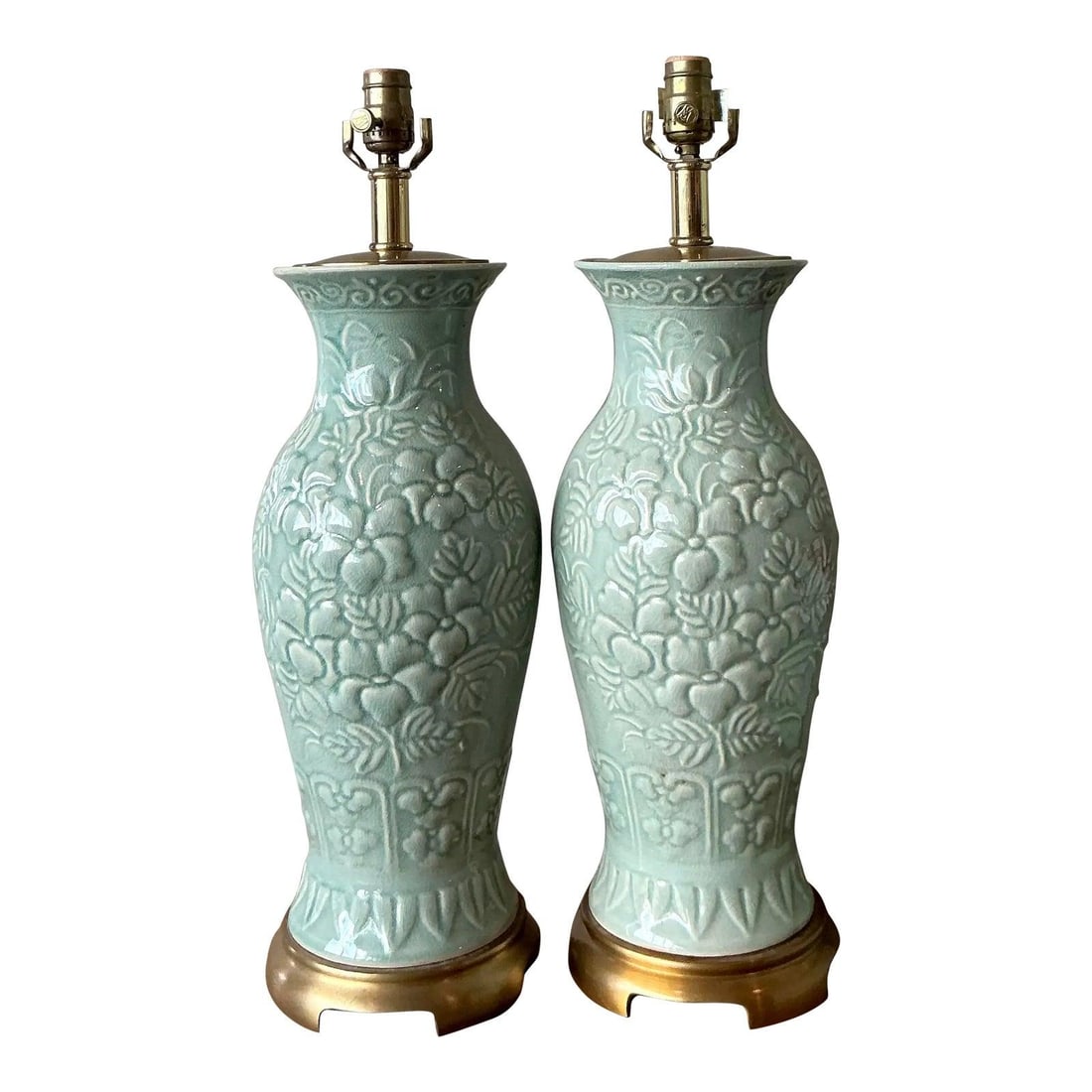 Pair of Celadon Green Urn Table Lamps with Brass by Maitland Smith: Pair of Celadon Green Urn Table Lamps with Brass by Maitland Smith This pair of vintage Maitland Smith table lamps showcases a celadon green ceramic body with an intricate raised relief of floral moti