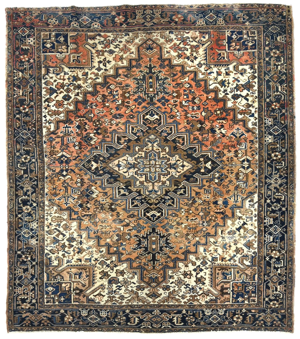 Handmade wool geometric oriental area rug 7'10 x 8'10: Handmade wool geometric oriental area rug 7'10 x 8'10 This semi-antique handmade Oriental area rug features a striking geometric design in shades of rusty peach, charcoal brown, cream, and navy. Exper