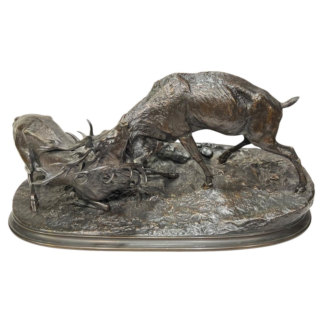 Patinated Bronze Sculpture of Battling Stags After Pierre Jules Mene: Patinated Bronze Sculpture of Battling Stags After Pierre Jules Mene This is an exceptional and large patinated bronze sculpture depicting two stags in battle, created after the original model by Fren