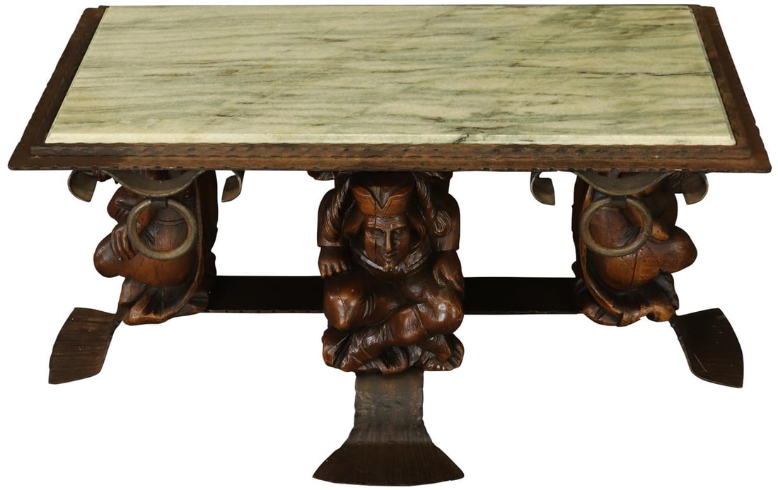 1930 French Renaissance Coffee Table Marble Walnut Fishtail Feet: 1930 French Renaissance Coffee Table Marble Walnut Fishtail Feet This elegant coffee table, part of the Courtiers collection, hails from France and dates back to 1930. Featuring a striking marble top 