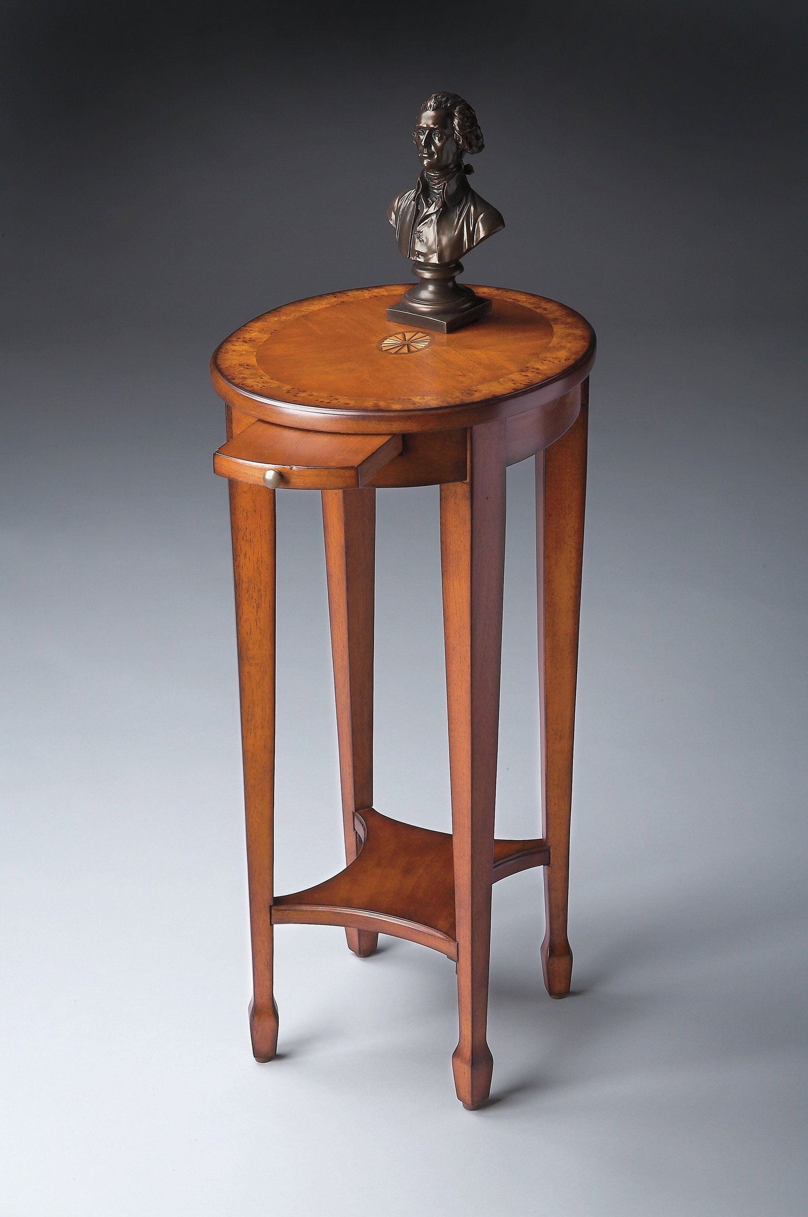 Butler Arielle Round Olive Ash Burl Accent Table: Butler Arielle Round Olive Ash Burl Accent Table This Round Olive Ash Burl Accent Table showcases a blend of antique and vintage styles, perfect for enhancing your home decor. Crafted with precision, 