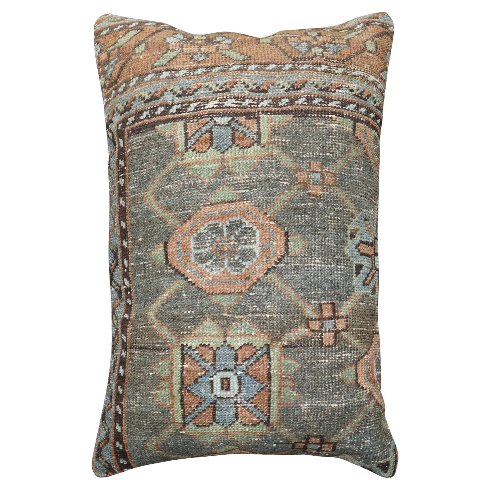 Lumbar Pillow Crafted From Antique Persian Kurd Tribal Wool Rug 16 x 24: Lumbar Pillow Crafted From Antique Persian Kurd Tribal Wool Rug 16 x 24 This large pillow is crafted from an early 20th-century antique Persian Kurd rug, featuring a distinctive tribal style. It is ma