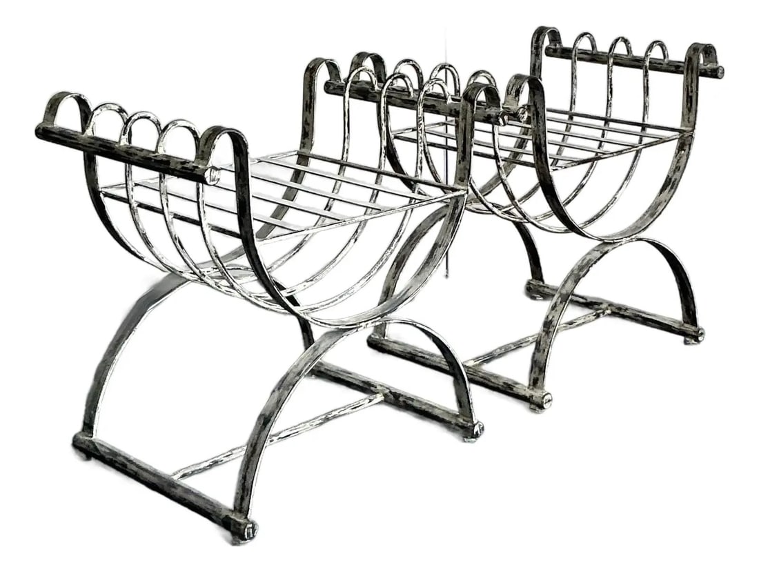 Pair of Wrought Iron Neoclassical X-Base Off-White Curule Benches: Pair of Wrought Iron Neoclassical X-Base Off-White Curule Benches This pair of vintage Neoclassical curule benches features an iconic "X"-shaped base and elegantly curved arms, inspired by ancient Rom