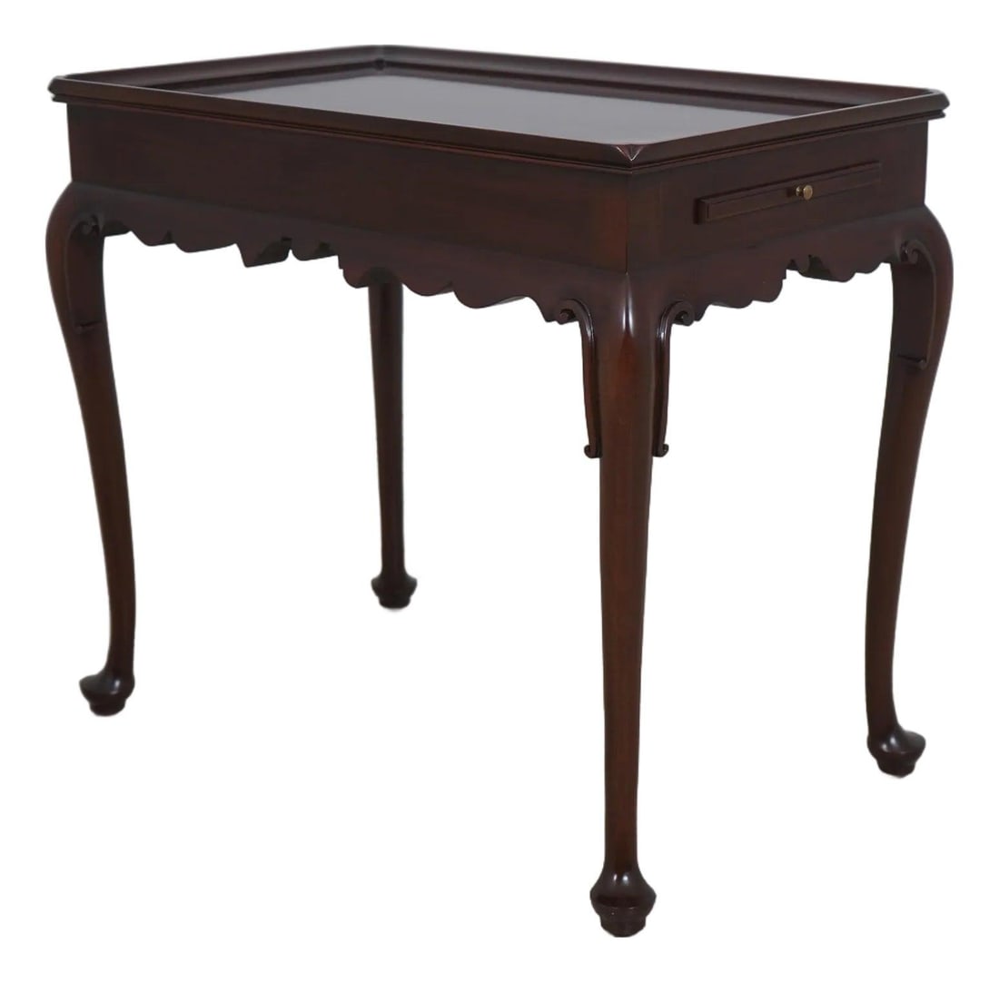 Henkel Harris Queen Anne Mahogany Tea Table with Candle Slides: Henkel Harris Queen Anne Mahogany Tea Table with Candle Slides This exquisite Queen Anne tea table by Henkel Harris showcases high-quality mahogany construction, featuring a rich brown finish (Finish 