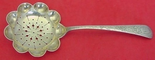 Tiffany & Co. Sterling Silver Monogrammed Sugar Sifter 6 3/8": Tiffany & Co. Sterling Silver Monogrammed Sugar Sifter 6 3/8" This exquisite Tiffany & Co. Sterling Silver Sugar Sifter measures 6 3/8" and showcases the timeless elegance associated with the renowned