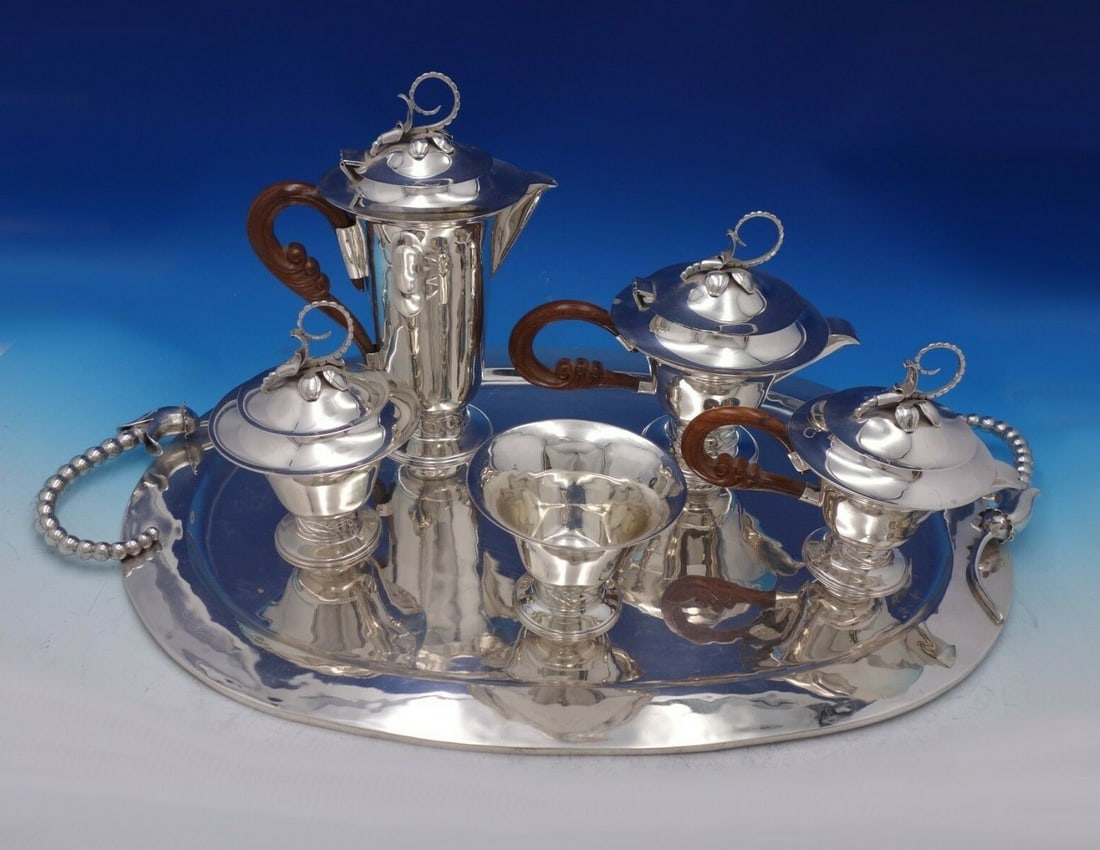 Louvre Silver Shop Blossom Mexican Sterling Silver 6pc Tea Set: Louvre Silver Shop Blossom Mexican Sterling Silver 6pc Tea Set Elevate your tea and coffee experience with this exquisite six-piece tea set from the renowned Louvre Silver Shop, featuring a stunning B