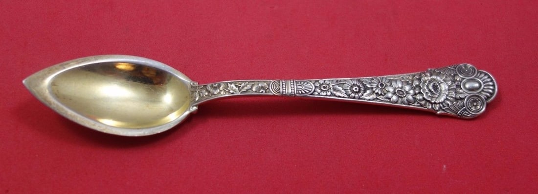 Gorham Cluny Sterling Silver Grapefruit Spoon Gold Wash 5 3/8": Gorham Cluny Sterling Silver Grapefruit Spoon Gold Wash 5 3/8" This exquisite 5 3/8" grapefruit spoon is part of the Cluny pattern by Gorham, crafted from high-quality sterling silver and enhanced