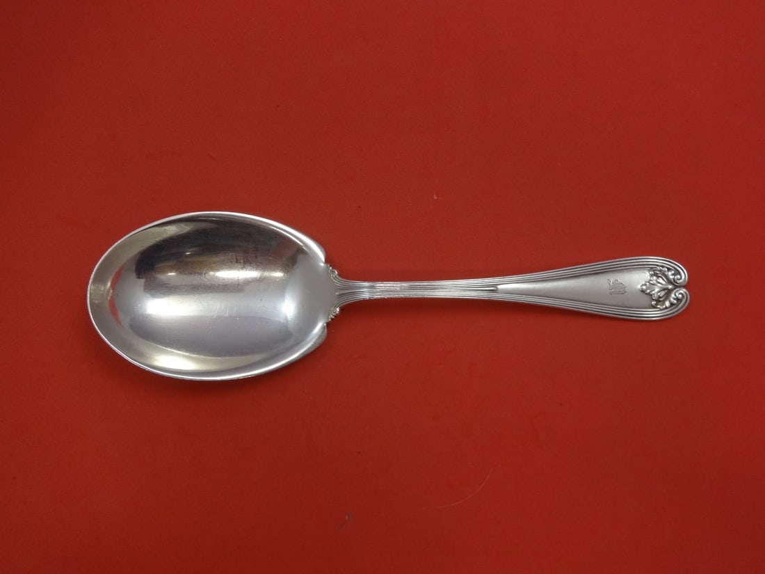 Tiffany & Co Colonial Sterling Silver Berry Spoon 9 1/8 inch: Tiffany & Co Colonial Sterling Silver Berry Spoon 9 1/8 inch This exquisite serving spoon is a Colonial pattern berry spoon crafted by Tiffany & Co., measuring 9 1/8 inches. Produced between 1850 and 