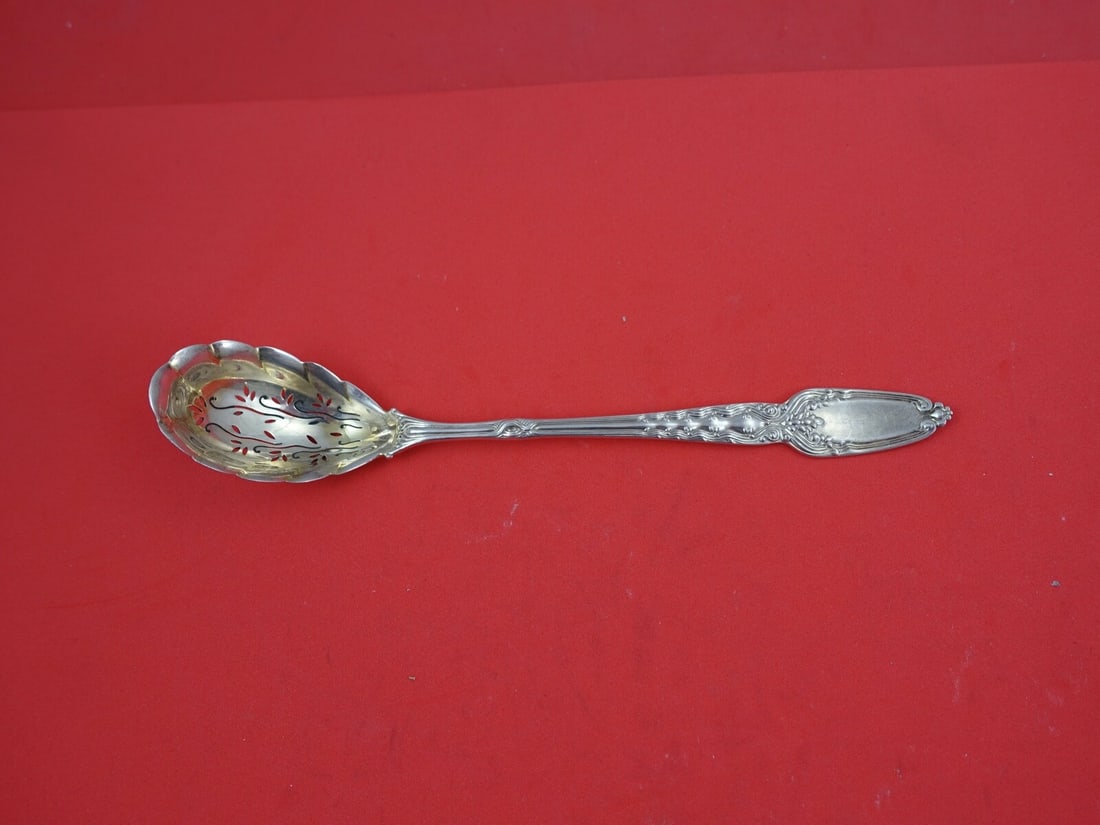 Tiffany & Co. Broom Corn Sterling Silver Olive Spoon 6.5 inches: Tiffany & Co. Broom Corn Sterling Silver Olive Spoon 6.5 inches This exquisite olive spoon features the iconic Broom Corn pattern by Tiffany & Co., crafted in high-quality sterling silver. Measuring 6