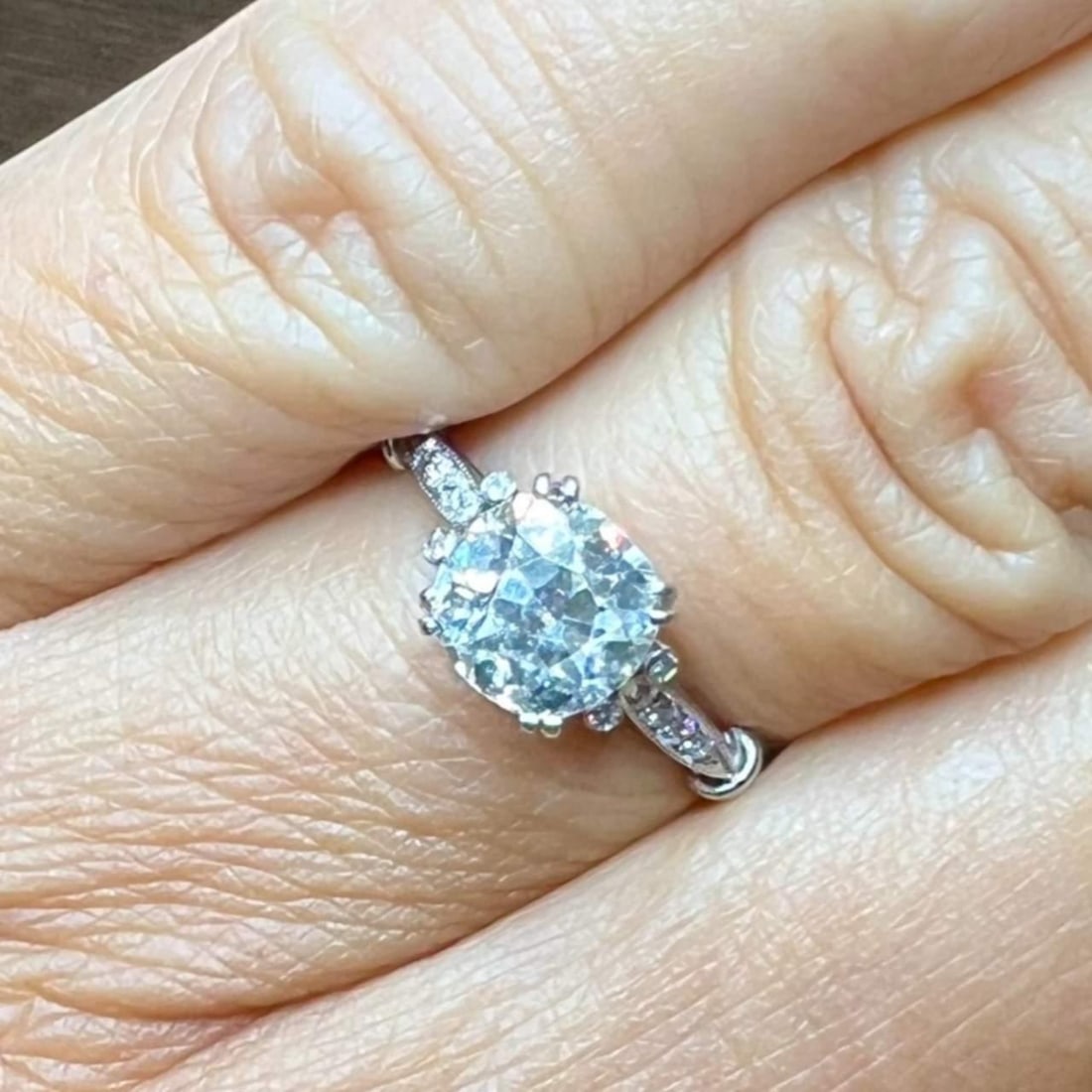 Platinum Engagement Ring 1.50 Ct Cushion-Cut Diamond I-J SI2: Platinum Engagement Ring 1.50 Ct Cushion-Cut Diamond I-J SI2 This exquisite engagement ring features a stunning 1.50 Ct. cushion-cut diamond at its center, showcasing a beautiful I-J color and SI2 cla