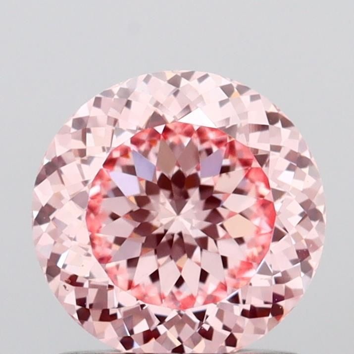 Loose Diamond - ROUND 1.09ct Fancy Intense Pink VVS2: Loose Diamond - ROUND 1.09ct Fancy Intense Pink VVS2 Source: This is a real non-mined Diamond that has been grown in a lab Shape: ROUND Carats: 1.09 Color: Fancy Intense Pink Certification: IGI Video: