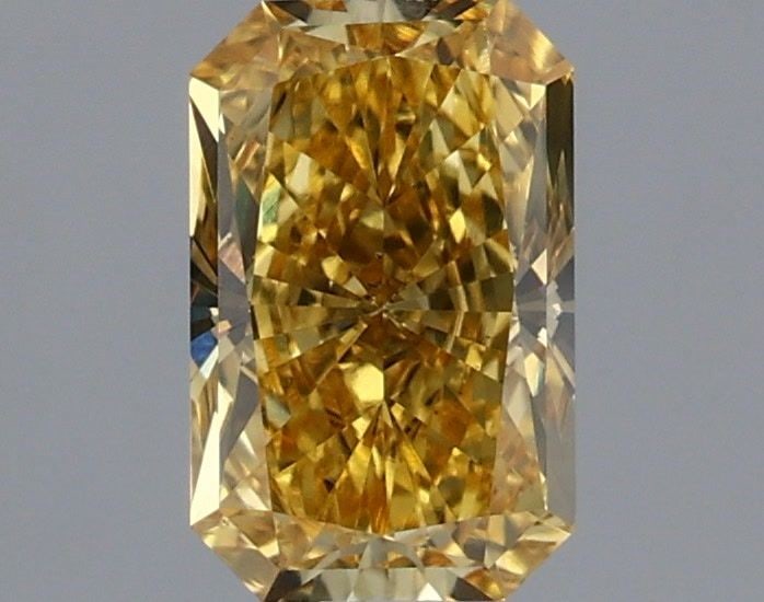 Loose Diamond - RADIANT 0.59ct Fancy Intense Yellow VS2: Loose Diamond - RADIANT 0.59ct Fancy Intense Yellow VS2 Source: This is a real non-mined Diamond that has been grown in a lab Shape: RADIANT Carats: 0.59 Color: Fancy Intense Yellow Certification: IGI