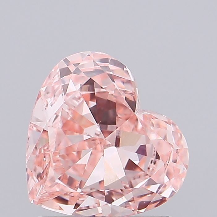 Loose Diamond - HEART 1.15ct Fancy Vivid Pink VS1: Loose Diamond - HEART 1.15ct Fancy Vivid Pink VS1 Source: This is a real non-mined Diamond that has been grown in a lab Shape: HEART Carats: 1.15 Color: Fancy Vivid Pink Certification: IGI Video: