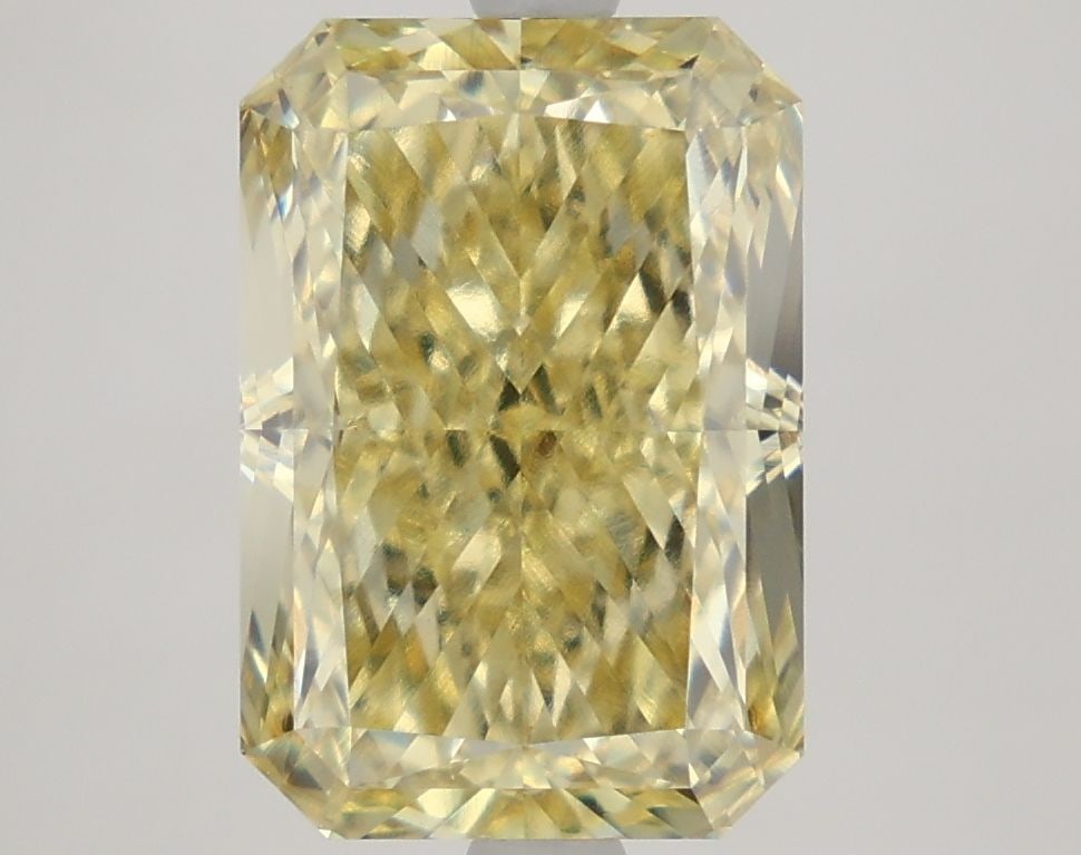 Loose Diamond - RADIANT 5.15ct Fancy Yellow VS1: Loose Diamond - RADIANT 5.15ct Fancy Yellow VS1 Source: This is a real non-mined Diamond that has been grown in a lab Shape: RADIANT Carats: 5.15 Color: Fancy Yellow Certification: IGI Video: