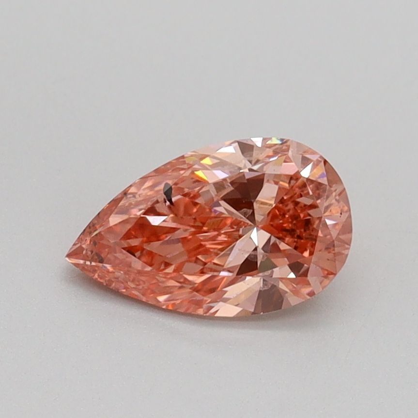 Loose Diamond - PEAR 0.7ct Fancy Vivid Pink SI2: Loose Diamond - PEAR 0.7ct Fancy Vivid Pink SI2 Source: This is a real non-mined Diamond that has been grown in a lab Shape: PEAR Carats: 0.7 Color: Fancy Vivid Pink Certification: IGI Video: