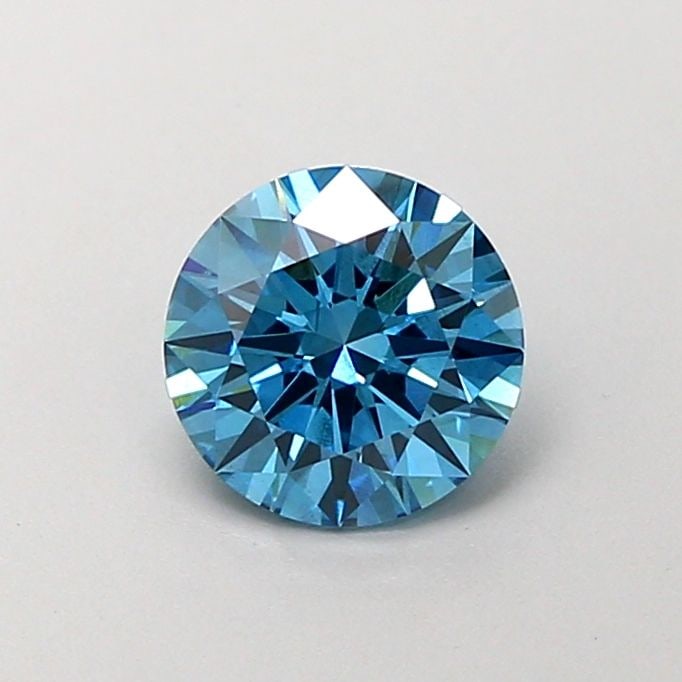 Loose Diamond - ROUND 1.05ct Fancy Vivid Blue VS2: Loose Diamond - ROUND 1.05ct Fancy Vivid Blue VS2 Source: This is a real non-mined Diamond that has been grown in a lab Shape: ROUND Carats: 1.05 Color: Fancy Vivid Blue Certification: IGI Video: