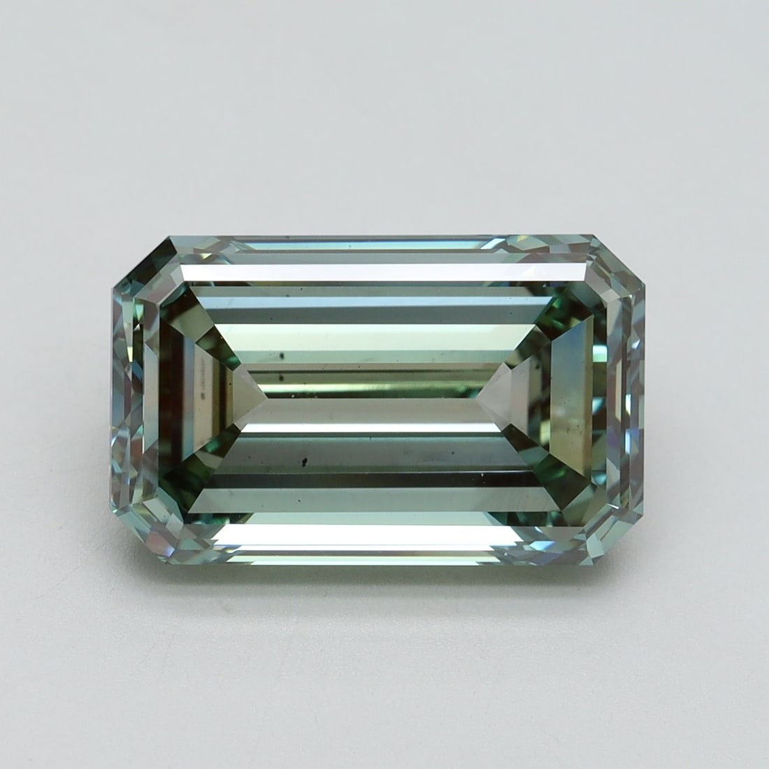 Loose Diamond - EMERALD 6.0ct Fancy Intense Green VS2: Loose Diamond - EMERALD 6.0ct Fancy Intense Green VS2 Source: This is a real non-mined Diamond that has been grown in a lab Shape: EMERALD Carats: 6.0 Color: Fancy Intense Green Certification: IGI
