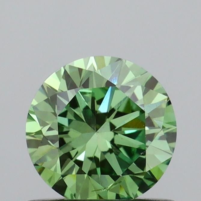 Loose Diamond - ROUND 0.65ct Fancy Vivid Green SI1: Loose Diamond - ROUND 0.65ct Fancy Vivid Green SI1 Source: This is a real non-mined Diamond that has been grown in a lab Shape: ROUND Carats: 0.65 Color: Fancy Vivid Green Certification: IGI Video: