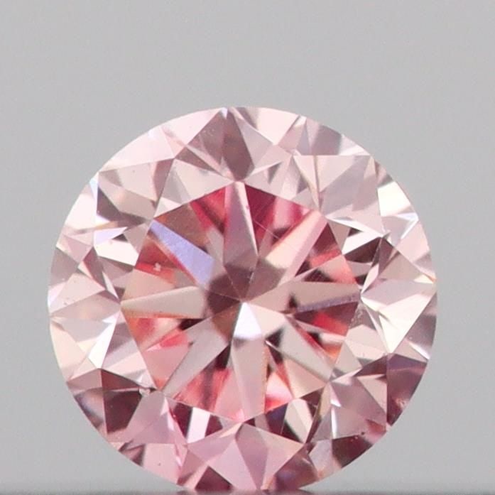 Loose Diamond - ROUND 0.12ct Fancy Pink VS1: Loose Diamond - ROUND 0.12ct Fancy Pink VS1 Source: This is a real non-mined Diamond that has been grown in a lab Shape: ROUND Carats: 0.12 Color: Fancy Pink Certification: IGI Video: Video Link