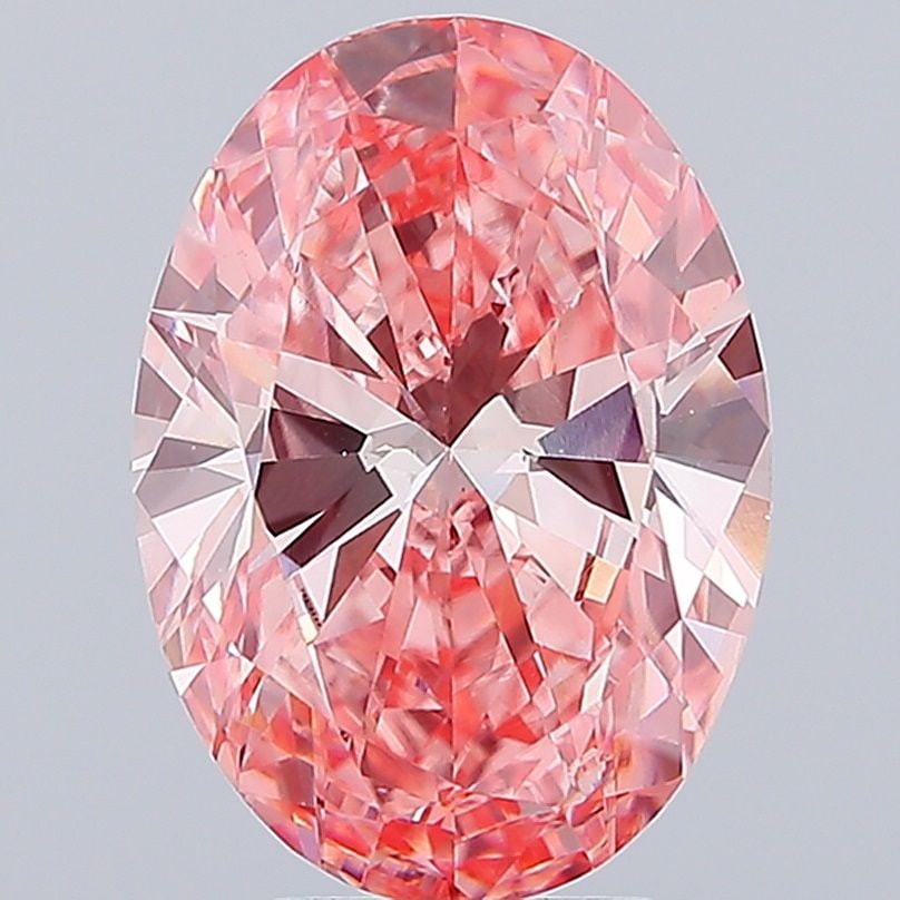 Loose Diamond - OVAL 5.21ct Fancy Vivid Pink VS1: Loose Diamond - OVAL 5.21ct Fancy Vivid Pink VS1 Source: This is a real non-mined Diamond that has been grown in a lab Shape: OVAL Carats: 5.21 Color: Fancy Vivid Pink Certification: IGI Video: