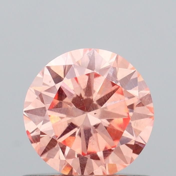 Loose Diamond - ROUND 0.64ct Fancy Intense Pink VS2: Loose Diamond - ROUND 0.64ct Fancy Intense Pink VS2 Source: This is a real non-mined Diamond that has been grown in a lab Shape: ROUND Carats: 0.64 Color: Fancy Intense Pink Certification: IGI Video: