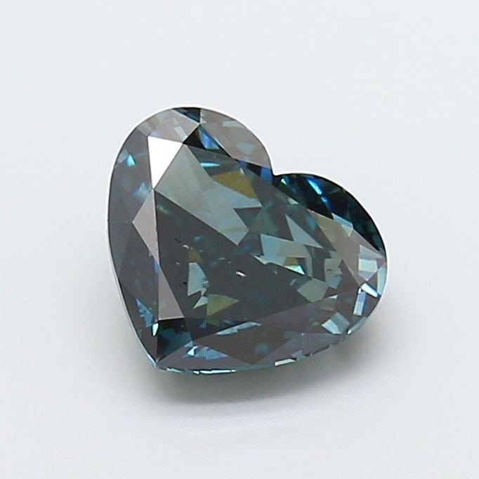 Loose Diamond - HEART 1.7ct Fancy Deep Green Blue VS2: Loose Diamond - HEART 1.7ct Fancy Deep Green Blue VS2 Source: This is a real non-mined Diamond that has been grown in a lab Shape: HEART Carats: 1.7 Color: Fancy Deep Green Blue Certification: IGI Vid