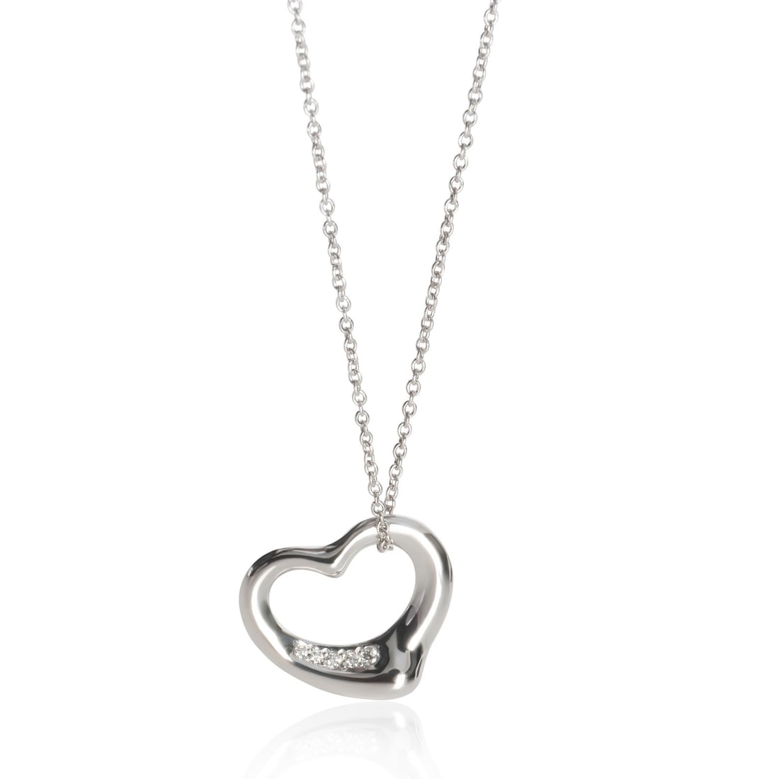 Elsa Peretti Open Heart Platinum Diamond Pendant Tiffany & Co.: Elsa Peretti Open Heart Platinum Diamond Pendant Tiffany & Co. This Tiffany & Co. Elsa Peretti Open Heart pendant features a platinum setting adorned with round brilliant diamonds totaling 0.02 carats