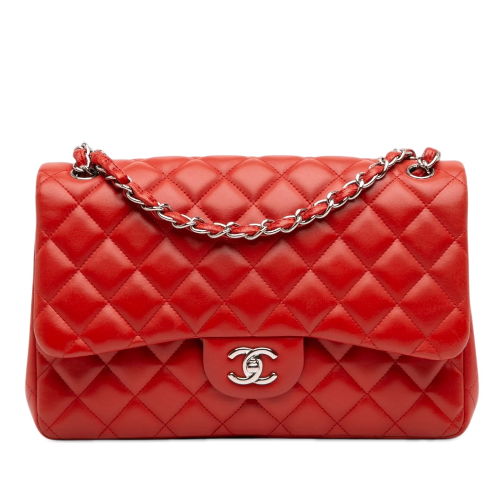 Chanel red lambskin Jumbo Classic Double Flap shoulder bag: Chanel red lambskin Jumbo Classic Double Flap shoulder bag This Chanel Jumbo Classic Lambskin Double Flap shoulder bag is crafted from quilted red lambskin leather and features velvet-woven chain stra
