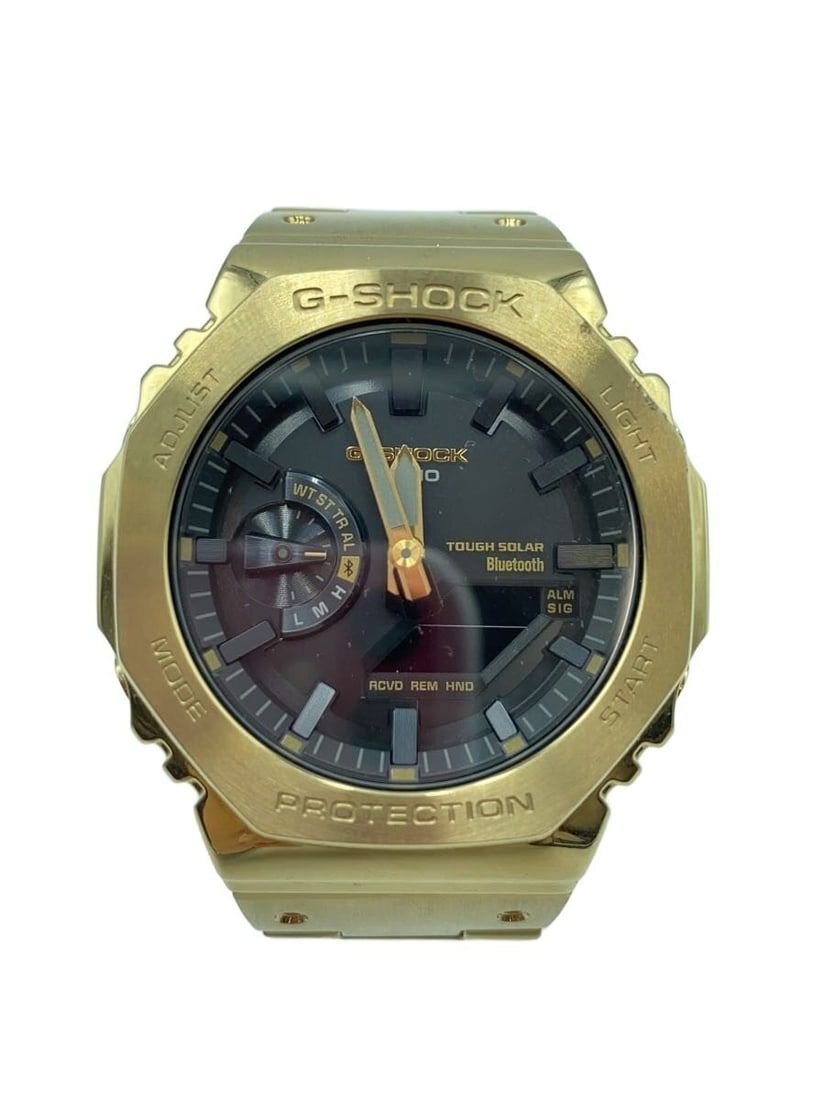Casio G Shock GM B2100 Stainless Steel Solar Wristwatch: Casio G Shock GM B2100 Stainless Steel Solar Wristwatch This CASIO G-SHOCK Metal Model Solar GM-B2100 wristwatch is designed for men and features a robust stainless steel construction with a black fin
