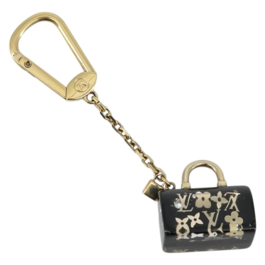 Louis Vuitton M65444 black gold plastic key holder: Louis Vuitton M65444 black gold plastic key holder This LOUIS VUITTON Speedy Porte Cles Unclusion key holder features a stylish design in black and gold plastic. Designed for women, it is compact and 