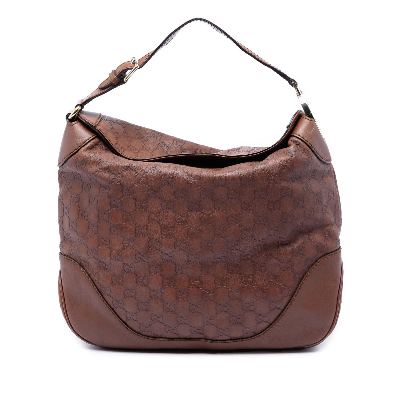 Gucci Guccissima embossed leather hobo bag: Gucci Guccissima embossed leather hobo bag This Guccissima Charlotte Hobo features a brown embossed leather body with a fold-over top and a flat leather strap adorned with silver-tone G logo hardware.