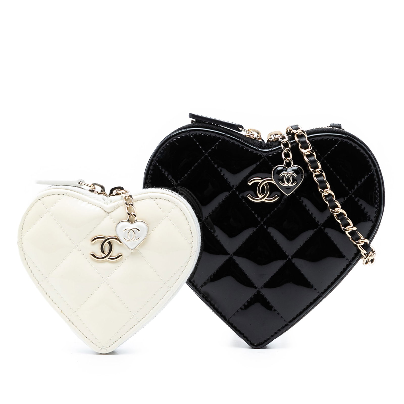 Chanel black patent leather heart clutch crossbody chain strap: Chanel black patent leather heart clutch crossbody chain strap This Chanel Quilted Patent Duo Heart Clutch with Chain is a stylish crossbody bag crafted from quilted patent leather in black. It featur