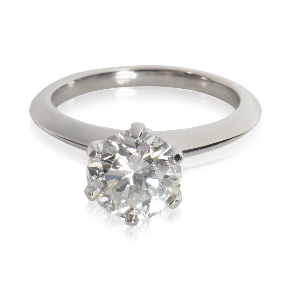 Tiffany & Co. 1.91ct Round Diamond Engagement Ring in Platinum: Tiffany & Co. 1.91ct Round Diamond Engagement Ring in Platinum This exquisite engagement ring from Tiffany & Co. features a stunning 1.91 ct round brilliant diamond, renowned for its clarity and brill